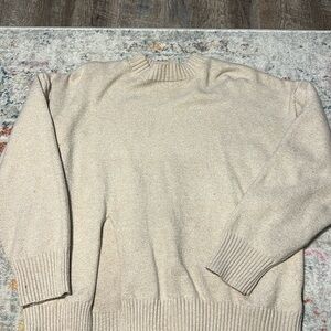 Tan sweater with slit